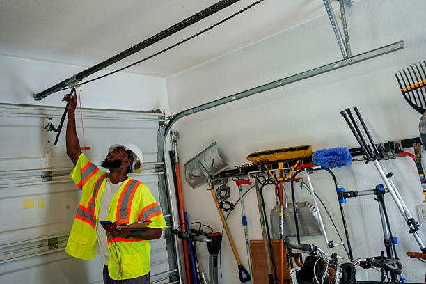 Professional Garage Door Panel Replacement technician working in West End, NY